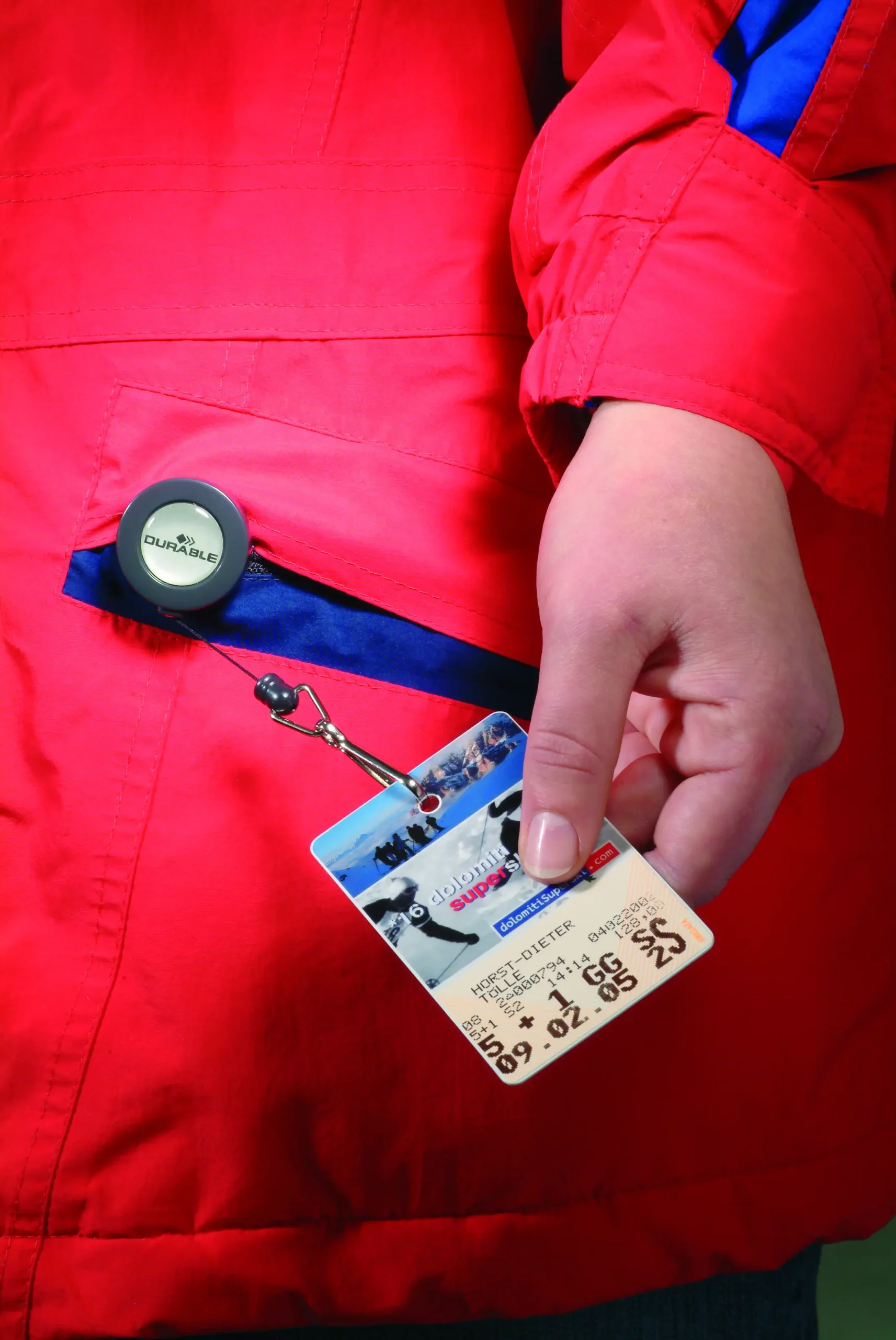 Badge reel with spring hook